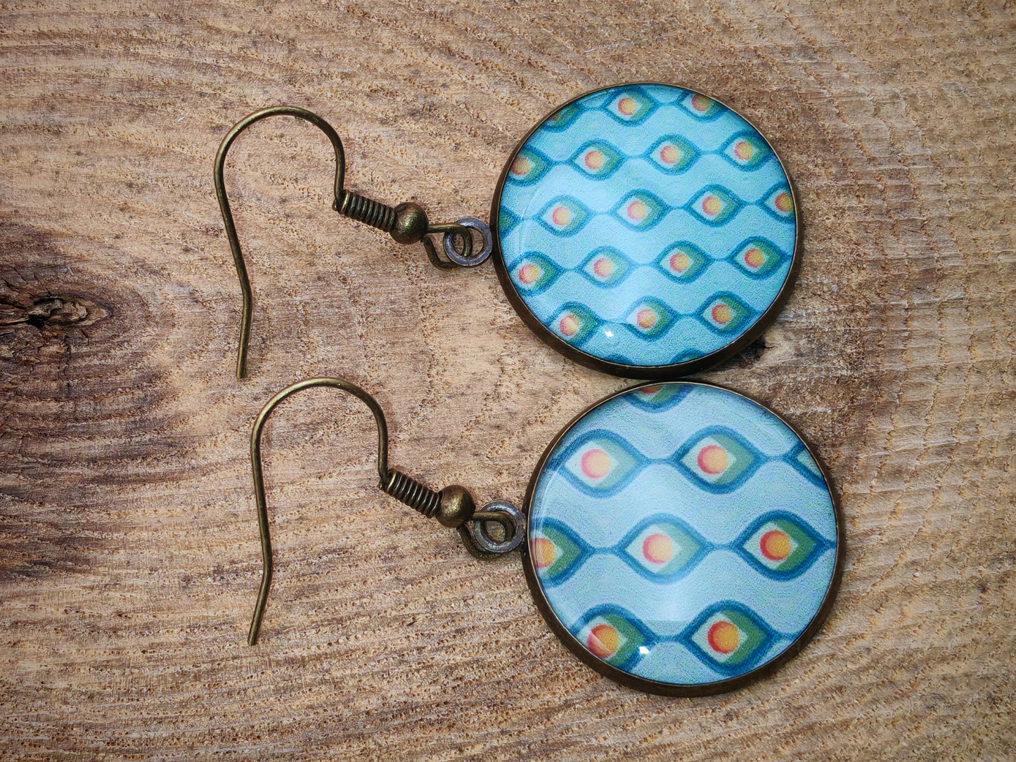 Boucles d’oreilles – Plumes de paon stylisées