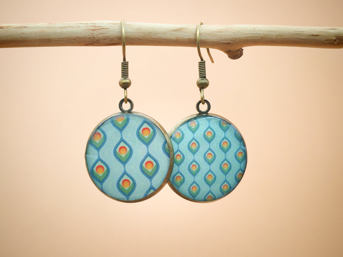 Boucles d’oreilles – Plumes de paon stylisées
