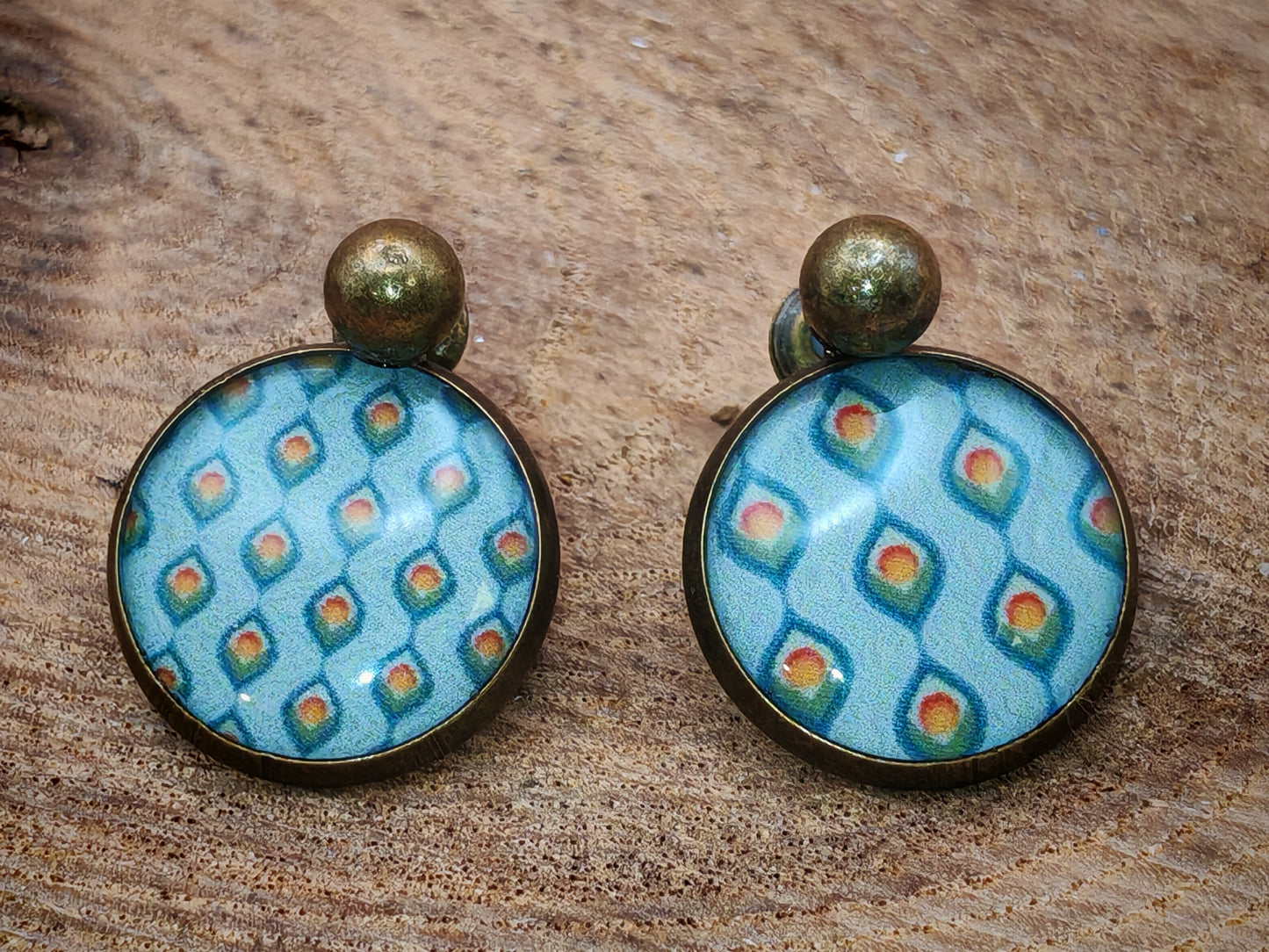 Boucles d’oreilles – Plumes stylisées sur ciel turquoise
