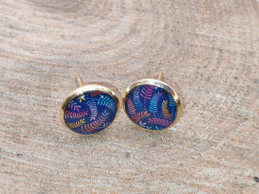 Clous cabochon de 10 mm – Feuillages colorés sur fond bleu texturé