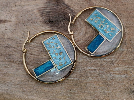 Boucles d’oreilles – Anneaux graphiques bleus et dorés