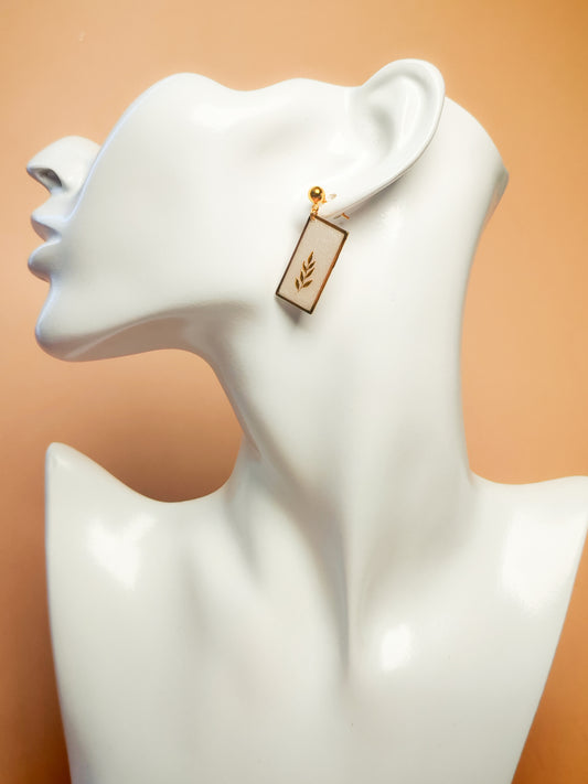 Boucles d’oreilles – Feuillages dorés suspendus