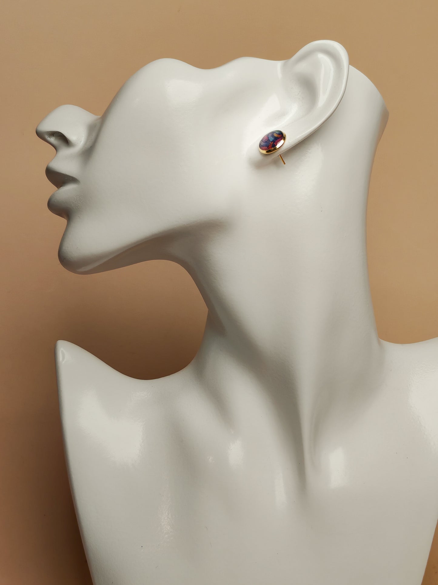 Clous cabochon de 10 mm – Feuillages colorés sur fond bleu texturé