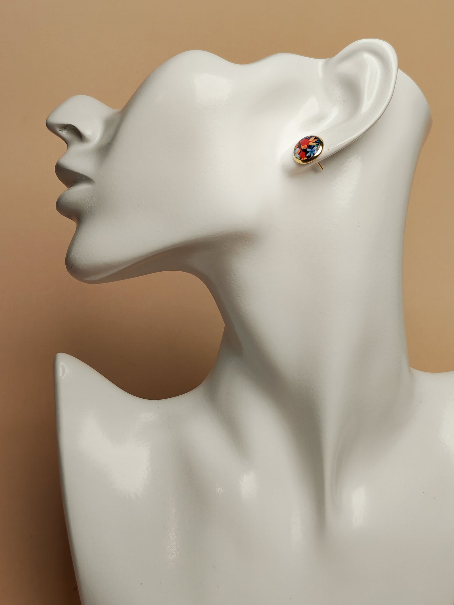 Clous cabochon de 10 mm – Feuillages colorés sur fond bleu texturé