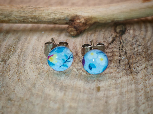 Clous d'oreilles – Éclats floraux sur ciel pastel