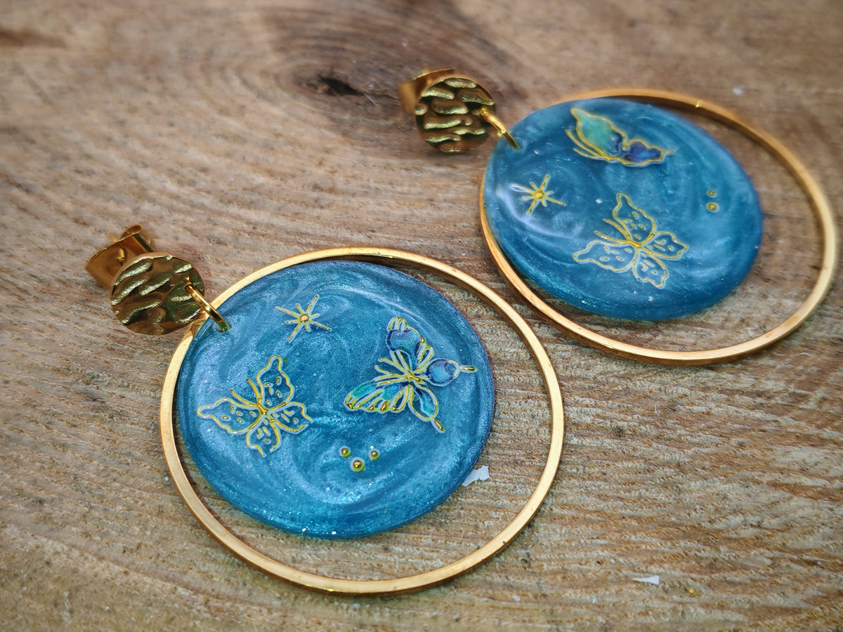 Boucles d’oreilles – Papillons dorés sur ciel givré