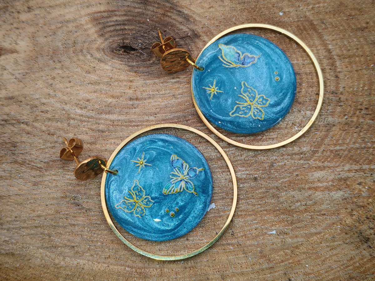 Boucles d’oreilles – Papillons dorés sur ciel givré