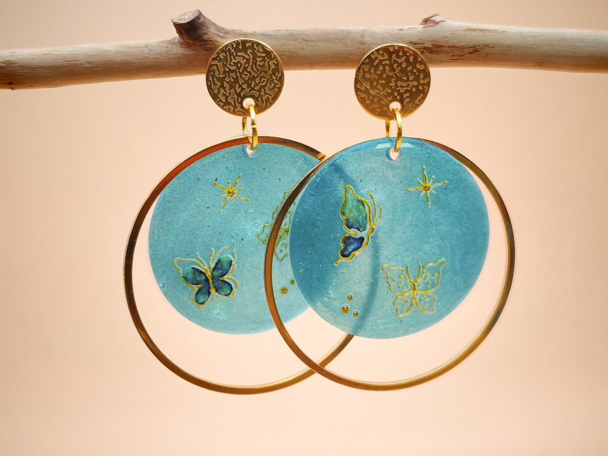 Boucles d’oreilles – Papillons célestes sur bleu givré