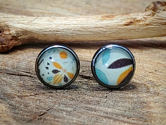 Clous d'oreille, acier inoxydable, cabochon de 6mm de diamètre en résine sur imprimé, motif asymétrique, fait main